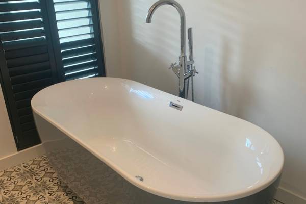 Photo of a new bathtub fitted in a bathroom in Southampton.